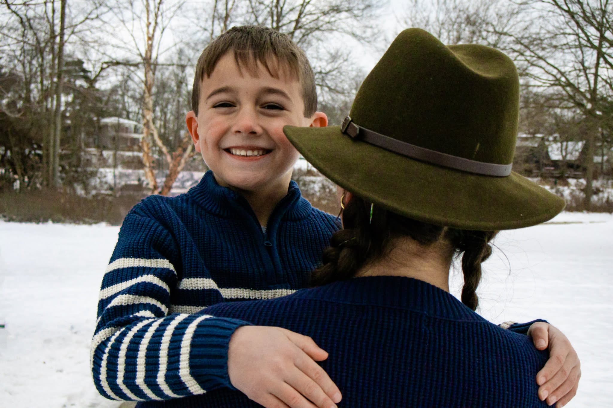 Joyful winter family moment in the snow